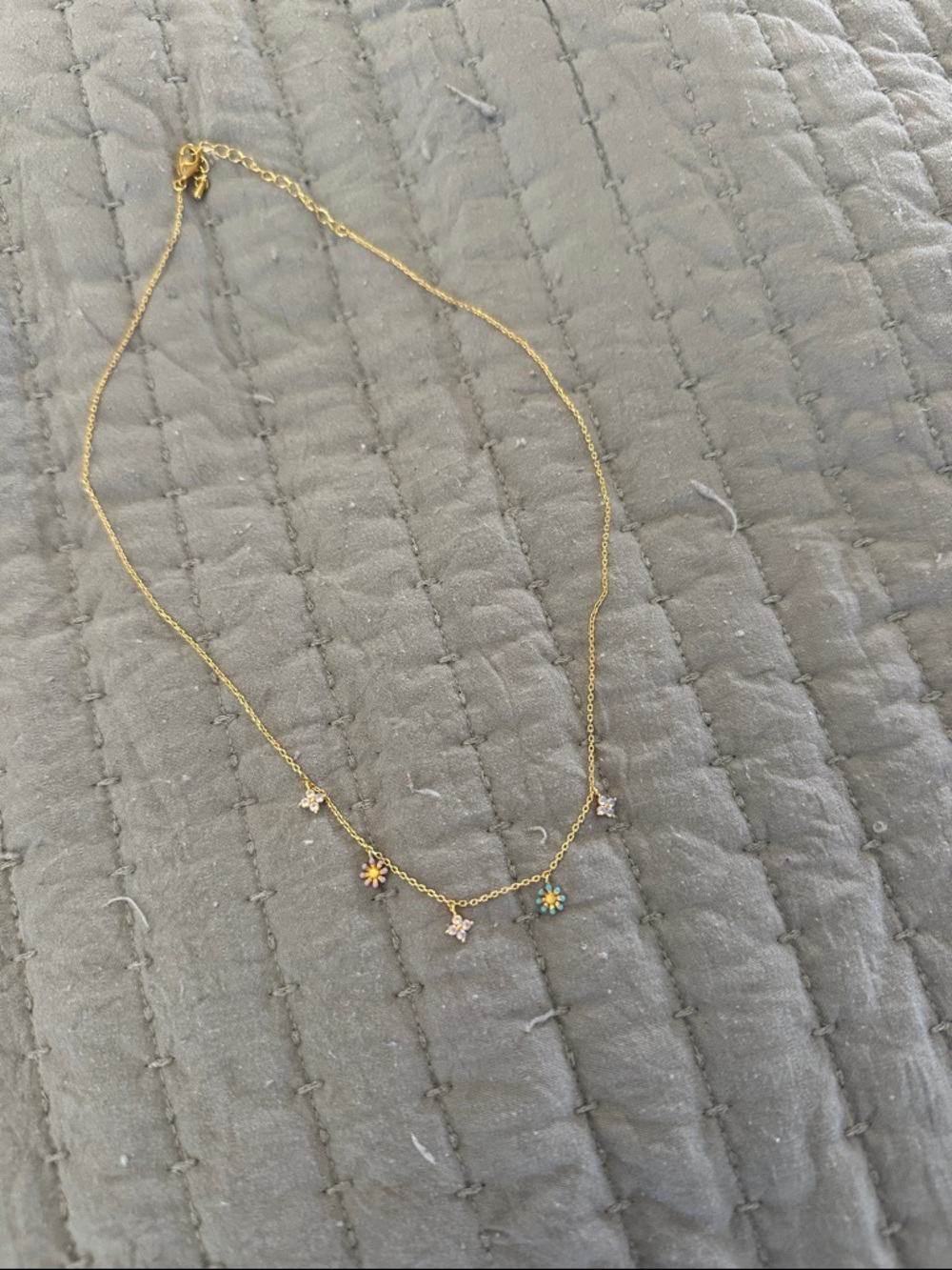 Gold-Tone Daisy Charm Necklace with Multicolor Flower Accents